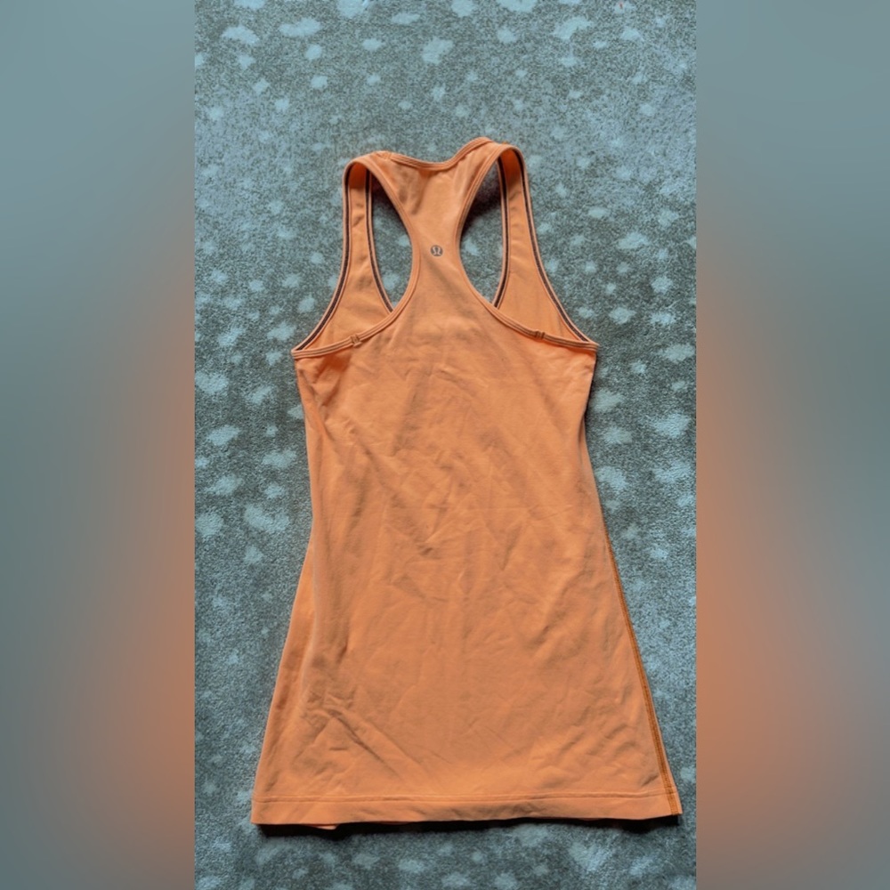 I am selling a orange lululemon tank-top that is a size 4!